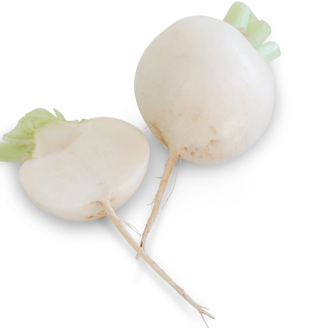 A whole and sliced Miyama Turnip on a white background.