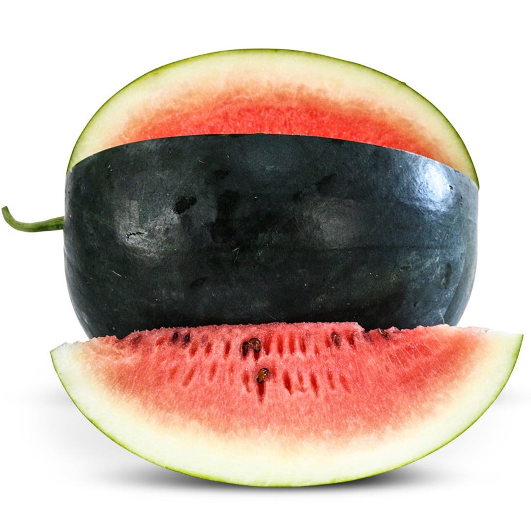 Whole Katanya Watermelon with a quarter sliced out on a white background.