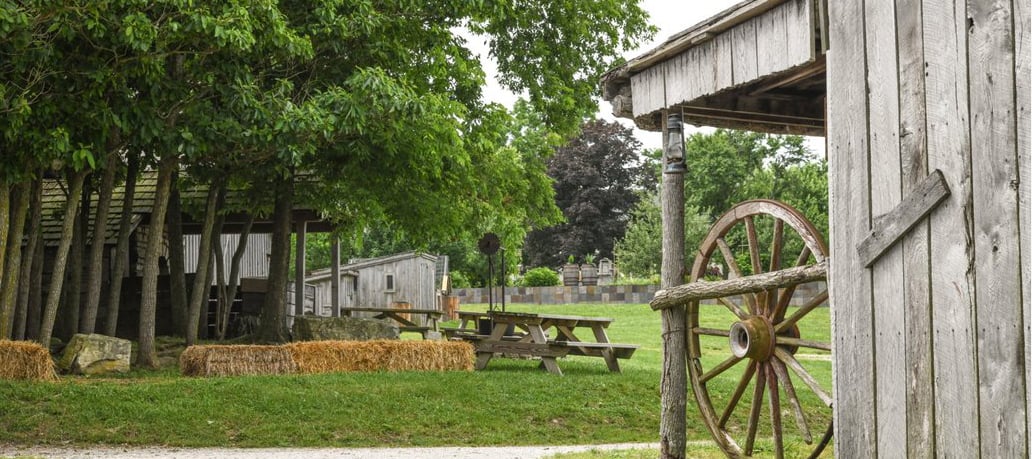 Near the blacksmith shop of the Ozark village