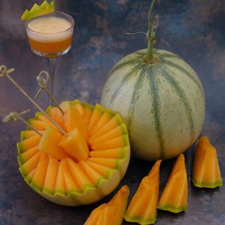 Charentais Melon with wedges and juice.