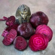 Crosby's Egyptian Beets arranged around a King Tut bust on a light brown background.