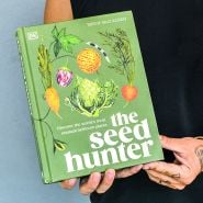 Mitch McCulloch holding his book The Seed Hunter.