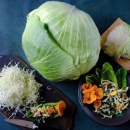 Brunswick Cabbage head with shaved cabbage and salad.