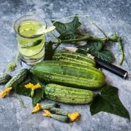 Dar Cucumber with slices in water.