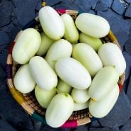 Dragon's Egg Cucumber in basket.