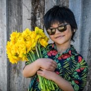 Cyan holding bouquet of Sizzling Fire Daffodil.