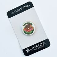 A Baker Creek Limited Edition Tulip Cabin Pin with packaging on white background.