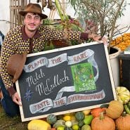 Mitch with cool calk sign at the Baker Creek Fall Harvest Festival.