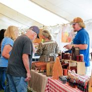 A vendor selling cool stuff at the Baker Creek Fall Harvest Festival.