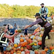 Selling the pumpkins at the auction at the end of the Baker Creek Fall Harvest Festival. 