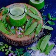 Mammoth Melting Sugar Snap pea on wooden plank.