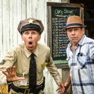 Barney Fife impersonator with a musician at the Baker Creek Spring Planting Festival.