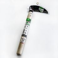 A Left Handed Professional Sickle with its packaging intact on a light background.