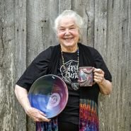 A pottery vendor showing her pottery at the Baker Creek Tulip Festival.