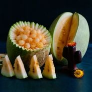 Desert King watermelon and cactus décor on a dark blue background.  
