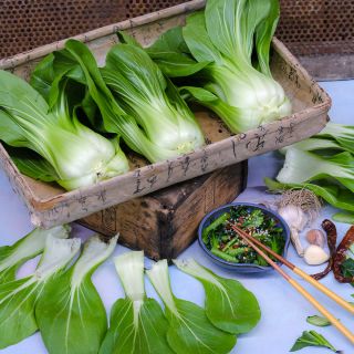 Suzhou Baby Bok Choy heads with sauteed and fresh leaves.
