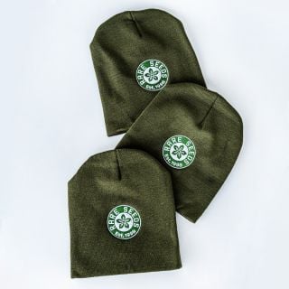 A trio of Baker Creek Logo Beanies arranged on white background.