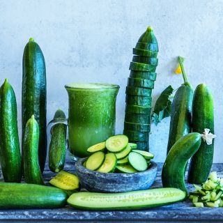 Beit Alpha Cucumber in, sliced and stacked with cucumber juice.