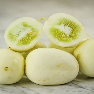 Dragon's Egg cucumber halved.