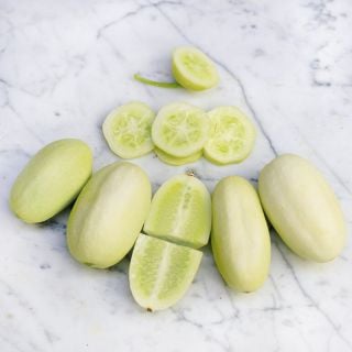Dragon's Egg Cucumber halved and sliced.