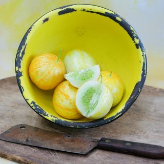 Lemon Cukes in yellow bowl.
