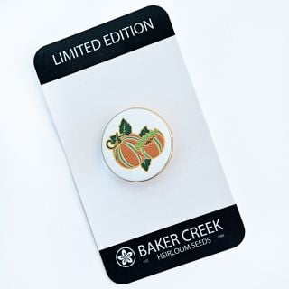 Baker Creek Kajari Melon Limited Edition Pin on a card on a white background.