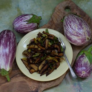 Listada De Gandia Eggplant along side prepared dish.