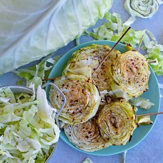 Roasted and seasoned cabbage steaks made from Filderkraut Cabbage slices.