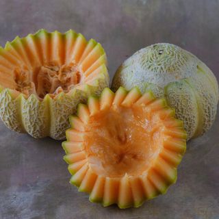 Golden Jenny Melons with jagged cut.