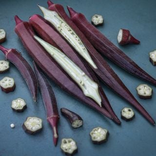 Bowling Red Okra halved with slices.