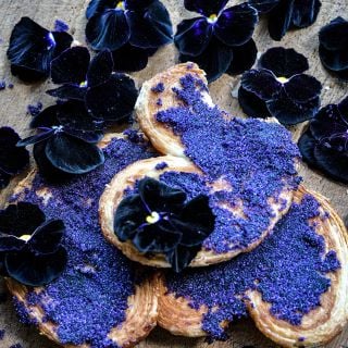 Bowles Black Violas with colored sugar on cookies.