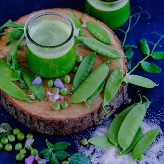 Mammoth Melting Sugar Snap pea on wooden plank.