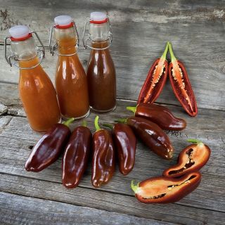 Brown Jalapeno peppers with home made hot sauce.