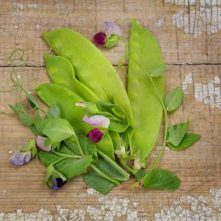 Carouby De Maussane Peas on wooden table.