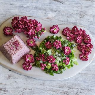 Vintage Brown Stock flowers with pink rice dyed from the flowers and salad.