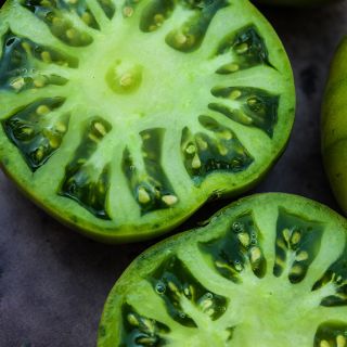 Close-up macro of juicy slices of the  Grandma Oliver's Green Tomato.