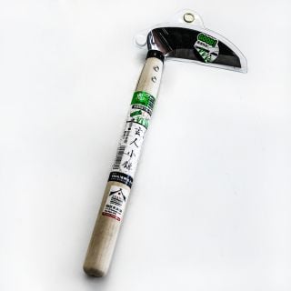 A Left Handed Professional Sickle with its packaging intact on a light background.