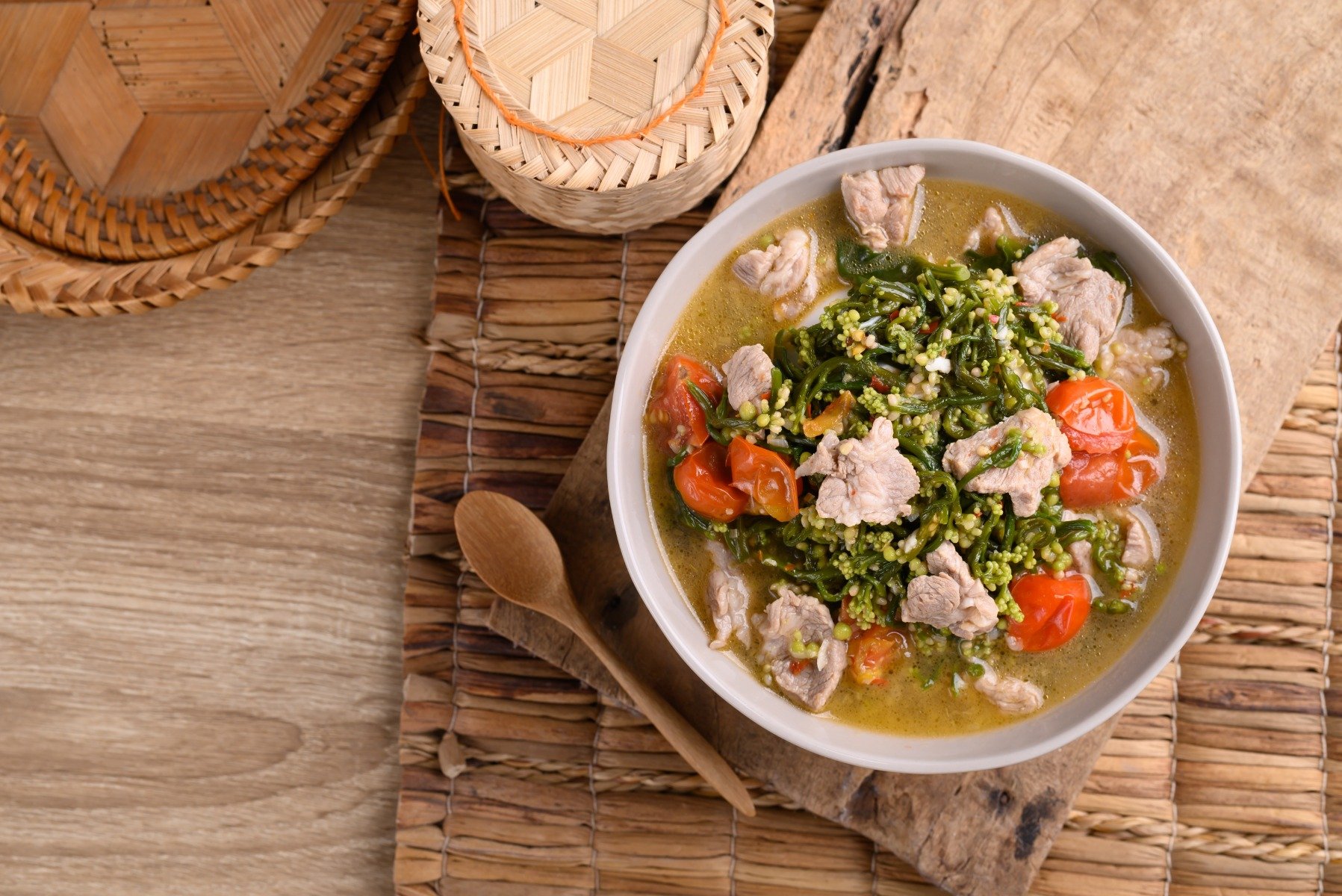 Malabar spinach soup with pork in a bowl